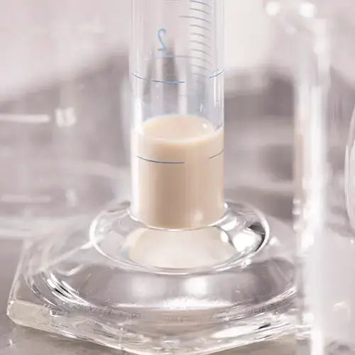 Water Soluble CBN 20% Potency — Fast-Acting Hemp Cannabinoid nano-emulsion solution in laboratory glassware, bulk formulation